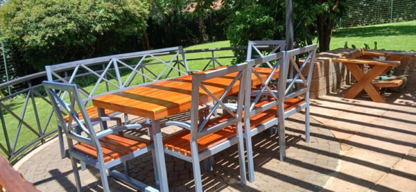 Garden table, curved bench and 5 chairs