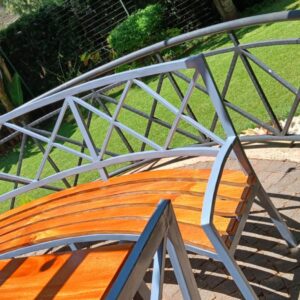 Garden table, curved bench and 5 chairs